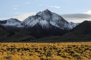 Snow capped mountain peak expedition climbers