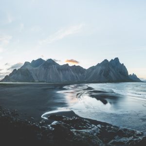 Iceland waterfall and dramatic green landscape