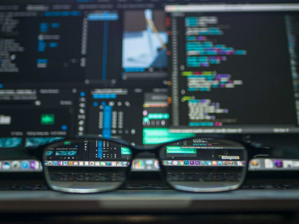 Abstract code and technology background for web development agency